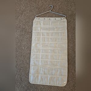 Beige Hanging Jewelry Organizer. 80 Compartments